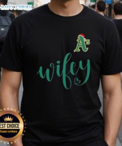 Good Wifey Oakland Athletics Santa Hat Merry Christmas T-Shirt featuring festive design for A's fans during the holidays.