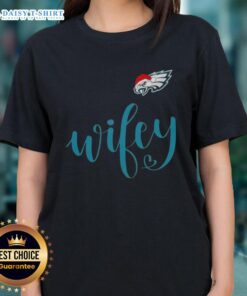 Good Wifey Philadelphia Eagles Santa Hat Merry Christmas Ladies Tee in festive green with holiday graphics.