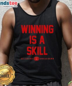 Good Winning is a Skill Oklahoma Breakdown Tank Top displayed on a mannequin, showcasing vibrant design and stylish fit.