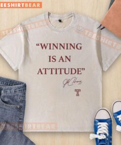 Good Winning Is An Attitude signature washed t-shirt featuring a motivational quote on a stylish design.