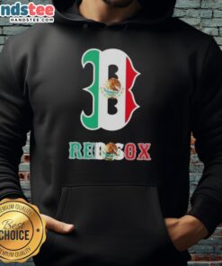 Happy Boston Red Sox baseball fan wearing a Mexican flag hoodie, showcasing team spirit and cultural pride.