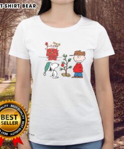 Happy Classic Christmas A Very Charlie Brown Tree Ladies Tee featuring a festive design with a whimsical tree illustration.