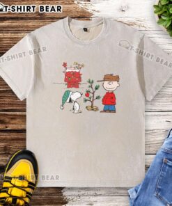 Alt Text: Happy Classic Christmas A Very Charlie Brown Tree washed t-shirt featuring a festive design with Charlie Brown's iconic tree.