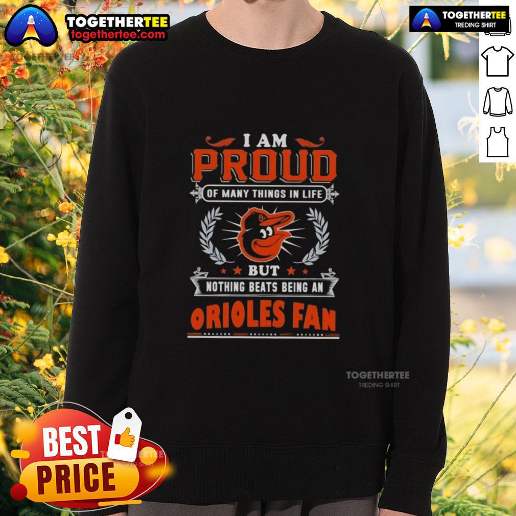 Happy I Am Proud Of Many Things In Life But Nothing Beats Being A Baltimore Orioles Fan Sweatshirt Happy Baltimore Orioles fan wearing a proud sweatshirt, celebrating their love for the team and sports spirit.