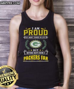 Happy Green Bay Packers fan wearing a proud tank top, celebrating their love for the team and football culture.