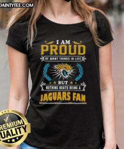 Happy Jacksonville Jaguars fan wearing a ladies tee, showcasing pride and love for the team in vibrant colors.