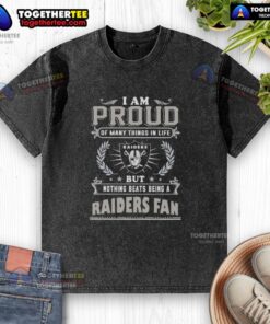 Alt Text: Proud Las Vegas Raiders fan wearing a washed T-shirt showcasing love for the team and celebrating fandom.