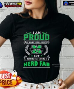 Happy fan wearing a Marshall Thundering Herd tee, celebrating pride in team spirit and life achievements.