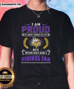 Happy Minnesota Vikings fan in a ladies tee, proud of her team and ready for game day excitement.