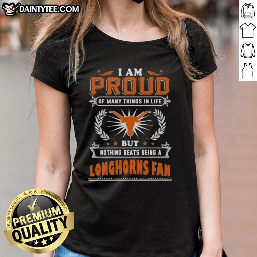 happy-i-am-proud-of-many-things-in-life-but-nothing-beats-being-a-texas-longhorns-fan-ladies-tee Happy Texas Longhorns fan wearing a proud ladies tee, celebrating their love for the team and Texas spirit.