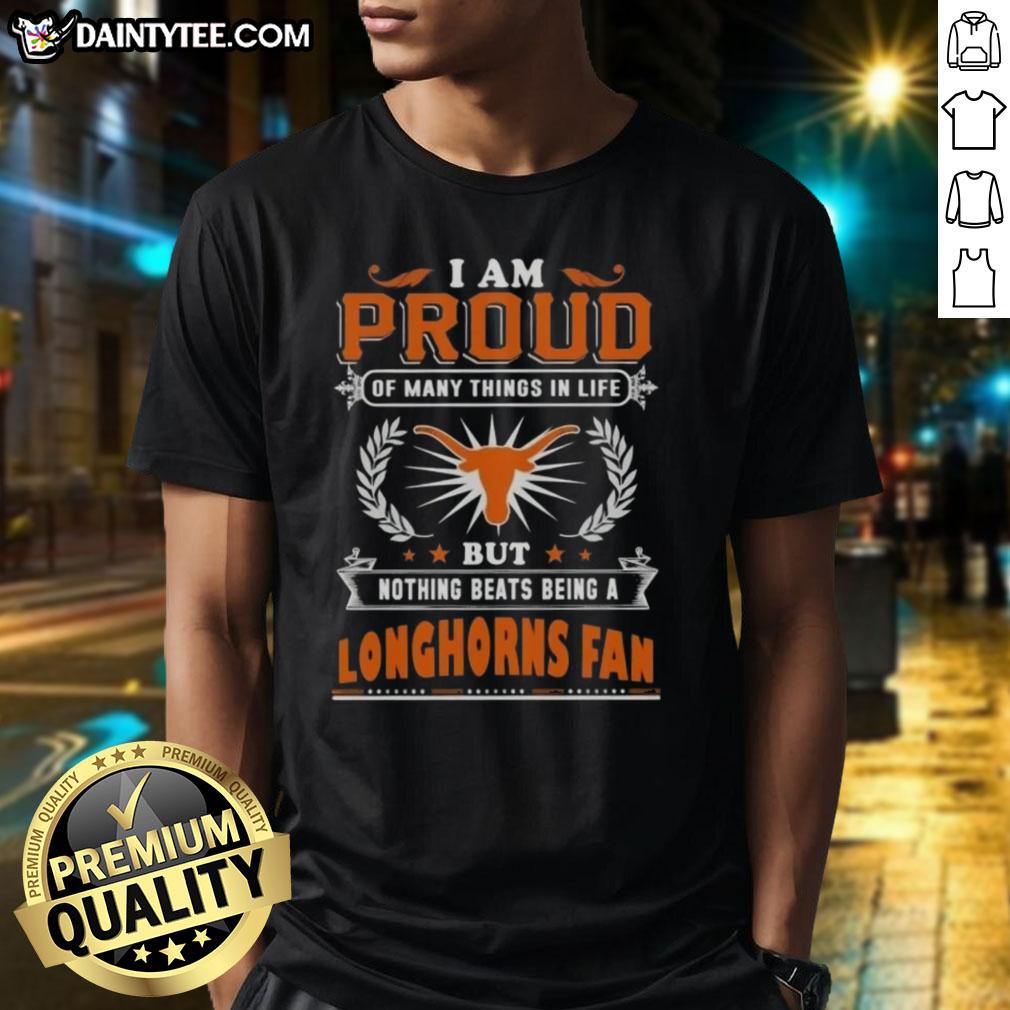 happy-i-am-proud-of-many-things-in-life-but-nothing-beats-being-a-texas-longhorns-fan-t-shirt Happy Texas Longhorns fan wearing a 'Proud Of Many Things' T-shirt, showcasing team spirit and pride in Texas football.