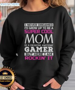 Alt Text: Happy sweatshirt featuring I Never Dreamed I'd Grow Up to Be a Super Cool Mom of a Freaking Awesome Gamer design.