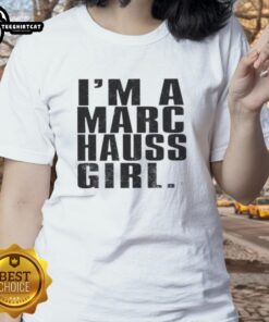 Happy woman wearing a Marc Hauss ladies tee, showcasing vibrant design and stylish comfort for casual outfits.