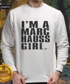 Happy girl wearing a Marc Hauss sweatshirt, showcasing stylish casual fashion and vibrant colors.