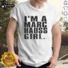 Alt Text: Happy I'M A Marc Hauss Girl T-Shirt displayed on a model, showcasing trendy fashion and vibrant colors.