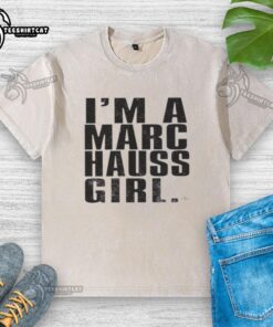 Happy model wearing a washed T-shirt from Marc Hauss, showcasing a trendy casual style and vibrant colors.