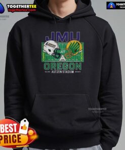 Alt Text: Happy fan wearing a James Madison Dukes hoodie at Autzen Field, cheering for the NCAA CFP 2025 against Oregon Ducks.