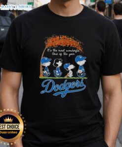 Alt Text: Happy Los Angeles Dodgers X Peanuts Snoopy and Friends autumn t-shirt featuring festive design for the holiday season.