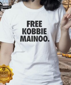 Happy man united's Mainoo's brother wearing Free Kobbie Mainoo ladies tee, showcasing team spirit and style.