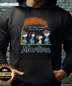 Cozy hoodie featuring Miami Marlins and Peanuts Snoopy for autumn, perfect for celebrating the most wonderful time of the year.