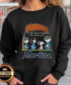 Happy Miami Marlins X Peanuts Snoopy and Friends sweatshirt for autumn, celebrating the most wonderful time of the year.