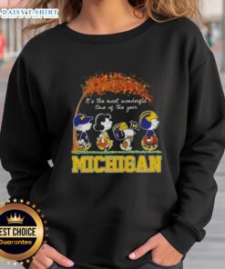 Happy Michigan Wolverines sweatshirt featuring Snoopy and friends, perfect for autumn and celebrating the season.