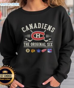 Alt Text: Happy Montreal Canadiens Original Six combined sweatshirt featuring team colors and logo, perfect for fans.