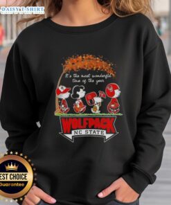Happy NC State Wolfpack sweatshirt featuring Snoopy and friends, perfect for autumn and celebrating the most wonderful time of the year.