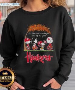 Happy Nebraska Cornhuskers sweatshirt featuring Snoopy and friends, perfect for autumn and celebrating the season.