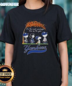Happy New York Yankees tee featuring Snoopy and friends, perfect for autumn and the holiday season.