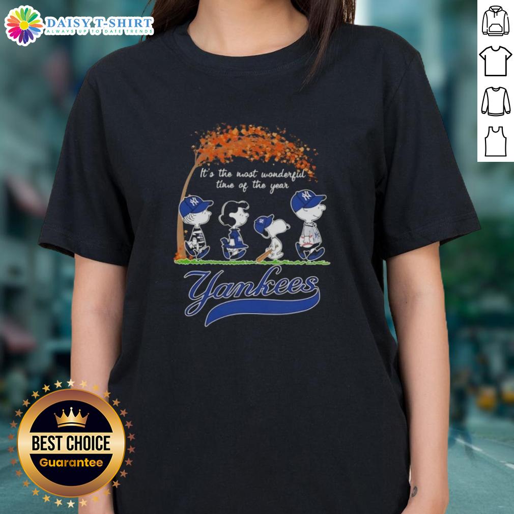 Happy New York Yankees X Peanuts Snoopy And Friends Autumn It's The Most Wonderful Time Of The Year Ladies-Tee Happy New York Yankees tee featuring Snoopy and friends, perfect for autumn and the holiday season.