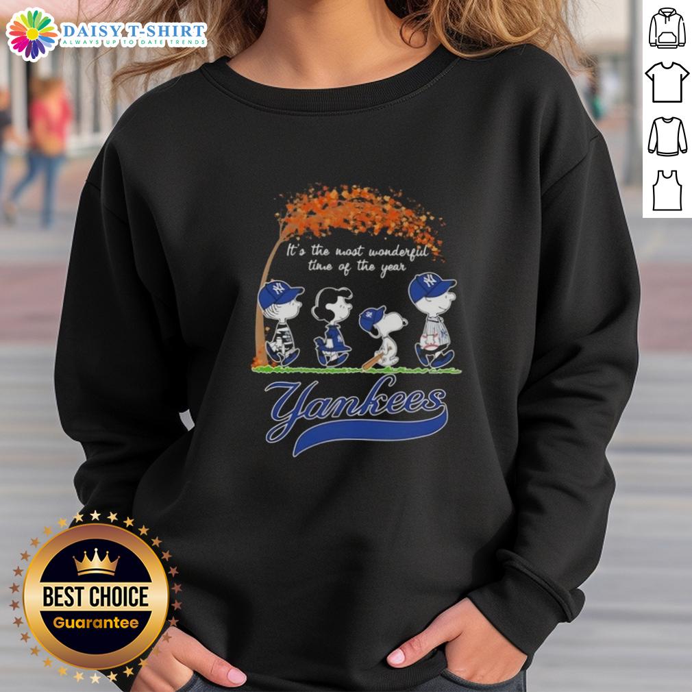 Happy New York Yankees X Peanuts Snoopy And Friends Autumn It's The Most Wonderful Time Of The Year Sweatshirt Happy New York Yankees X Peanuts Snoopy sweatshirt celebrating autumn and the most wonderful time of the year.