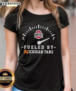 Happy Ohio State Buckeyes fans in a ladies tee, celebrating with excitement and spirit at a Michigan rivalry game.