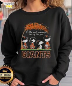 Alt Text: Happy San Francisco Giants X Peanuts Snoopy sweatshirt featuring autumn designs, perfect for the most wonderful time of the year.