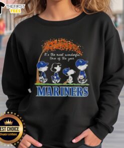 Alt Text: Happy Seattle Mariners X Peanuts Snoopy sweatshirt featuring autumn designs, perfect for the most wonderful time of the year.