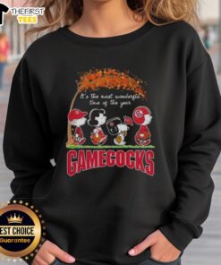 Happy South Carolina Gamecocks sweatshirt featuring Snoopy and friends, perfect for autumn celebrations and game day.