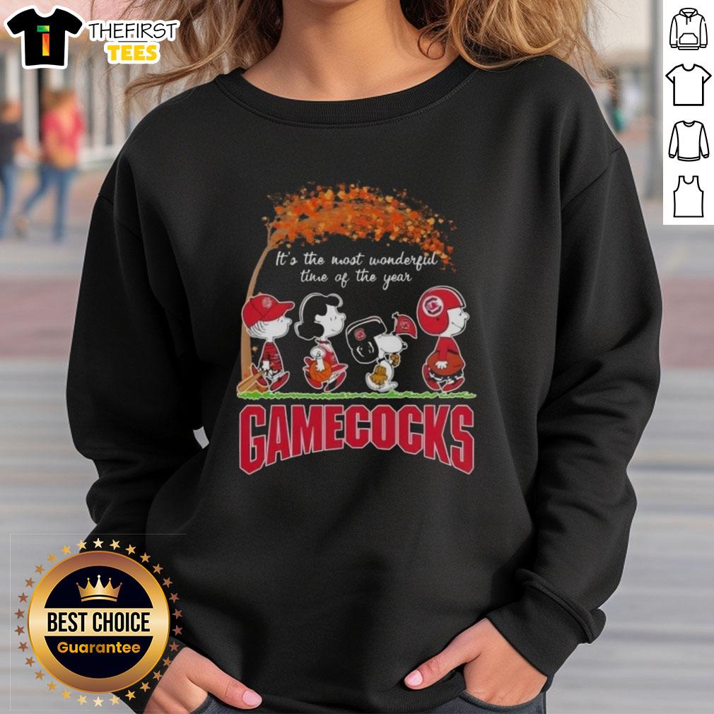 happy-south-carolina-gamecocks-x-peanuts-snoopy-and-friends-autumn-its-the-most-wonderful-time-sweatshirt Happy South Carolina Gamecocks sweatshirt featuring Snoopy and friends, perfect for autumn celebrations and game day.