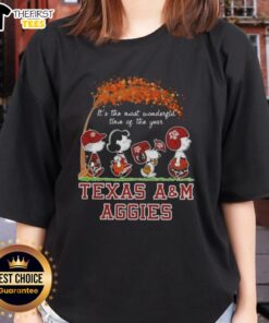 Happy Texas A&M Aggies tee featuring Snoopy and friends celebrating autumn, perfect for the most wonderful time of the year.