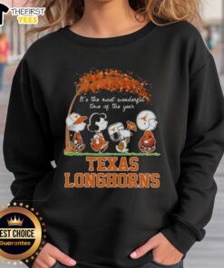 Happy Texas Longhorns X Peanuts Snoopy and Friends Autumn sweatshirt featuring festive designs for the holiday season.