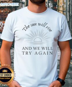 Alt Text: Happy The Sun Will Rise And We Will Try Again T-Shirt featuring a motivational design in bright colors.