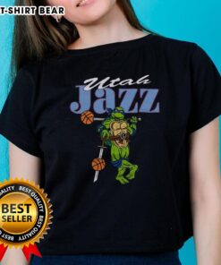 Happy TMNT Leonardo wearing a Utah Jazz ladies tee, blending pop culture with sports fashion for a fun look.