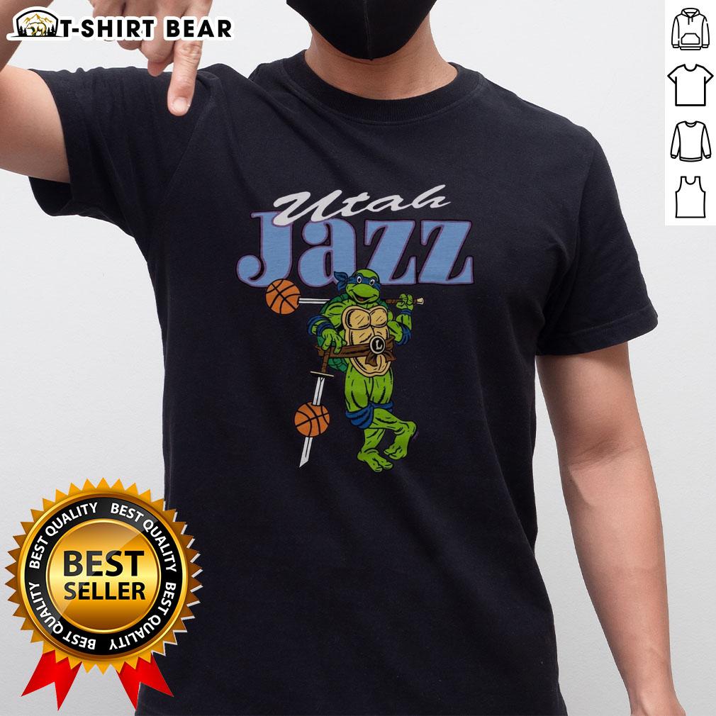 Happy Tmnt Leonardo X Utah Jazz T Shirt Happy TMNT Leonardo X Utah Jazz T-Shirt featuring a vibrant design celebrating the Teenage Mutant Ninja Turtles and basketball.