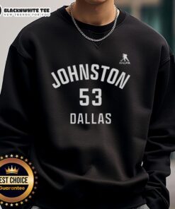 Happy Wyatt Johnston wearing a Dallas Stars sweatshirt with number 53, showcasing team spirit in ice hockey.