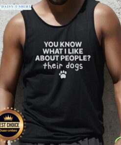 Alt Text: Happy woman wearing 'You Know What I Like About People? Their Dogs' tank top, enjoying time outdoors with a dog.