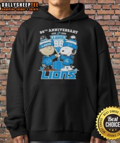Alt Text: Hot Charlie Brown and Snoopy hoodie celebrating 96th anniversary, featuring Detroit Lions football skyline design.