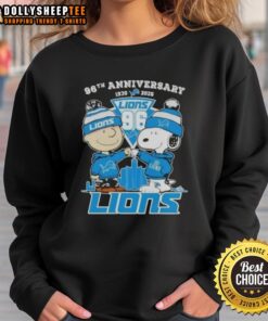 Alt Text: Hot Charlie Brown and Snoopy 96th Anniversary sweatshirt for Detroit Lions football featuring skyline design.