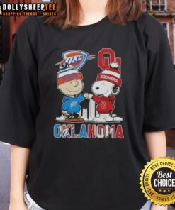 Alt Text: Hot Charlie Brown and Snoopy Oklahoma City Sports Thunder x Sooners skyline ladies tee featuring vibrant graphics.