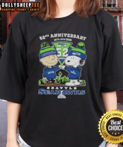 Hot Charlie Brown and Snoopy Super Bowl tee celebrating 52nd anniversary with Seattle Seahawks football skyline design.