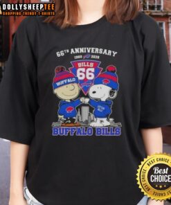 Alt Text: Hot Charlie Brown and Snoopy Super Bowl 66th Anniversary Tee celebrating Buffalo Bills football skyline 1960-2026.