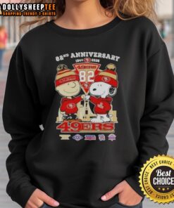 Alt Text: Hot Charlie Brown and Snoopy Super Bowl sweatshirt celebrating 82nd anniversary, featuring 49ers football skyline design.